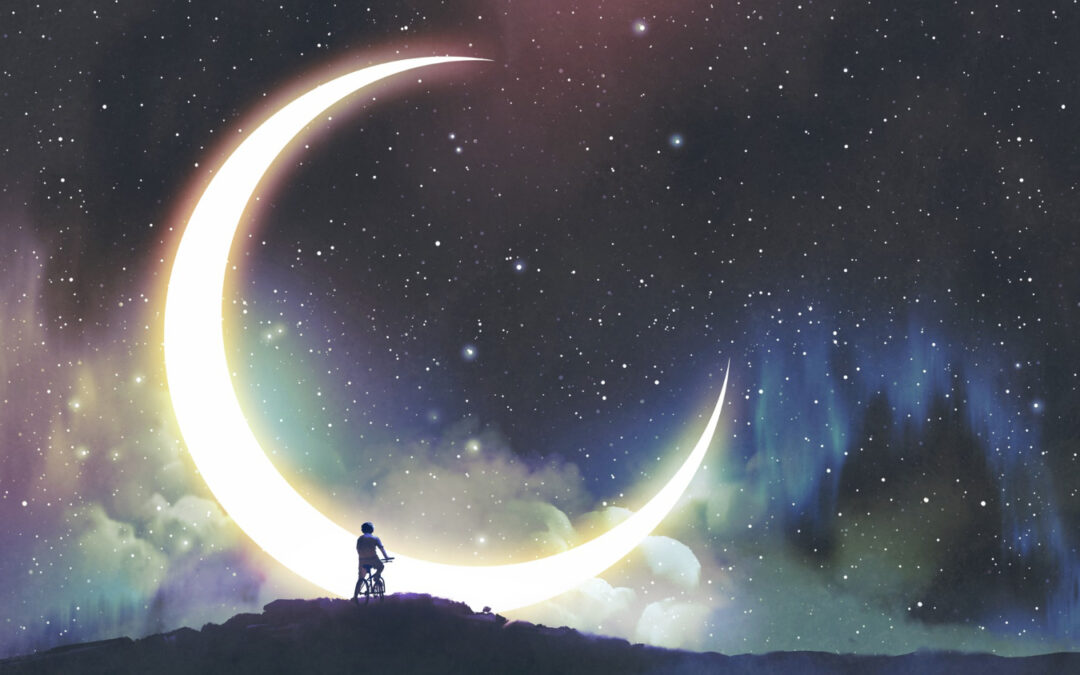 The boy on bicycle looking at the crescent moon in the beautiful night sky